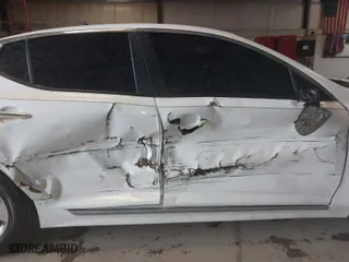 2014 Kia Optima Hybrid LX with VIN KNAGM4AD0E5075798, listed as a IAAI auction lot 41729949 with 150,552 mi miles. Bid and sale history available at carsss.com. Image 6.