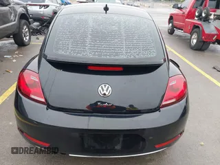 2017 Volkswagen Beetle 1.8T SE with VIN 3VWJ17AT9HM618202, listed as a IAAI auction lot 41562078 with 101,808 mi miles. Bid and sale history available at carsss.com. Image 16.