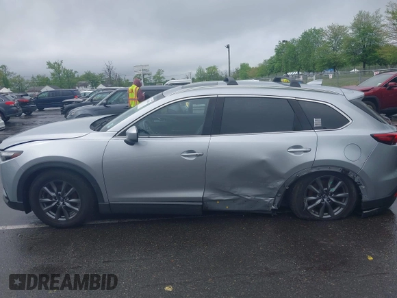 2020 Mazda CX-9 Touring with VIN JM3TCBCY8L0400787, listed as a IAAI auction lot 42188981 with 86,459 mi miles and . Bid and sale history available at DreamBid. Image 14.