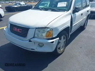 2003 GMC Envoy SLT z VIN 1GKDS13S532221928, wystawiony jako IAAI lot #42211340 z przebiegiem 149 902 mil mil oraz . Historia ofert i sprzedaży dostępna na DreamBid. Obrazek 6.