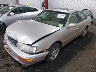 1997 Toyota Avalon XL with VIN 4T1BF12BXVU163858, listed as a IAAI auction lot 41486234 with 228,917 mi miles and . Bid and sale history available at DreamBid. Image 2.