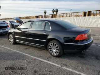 2006 Volkswagen Phaeton z VIN WVWAF03D268002733, wystawiony jako Copart lot #44980475 z przebiegiem 90 539 mil mil oraz Czysty tytuł • Clean title. Historia ofert i sprzedaży dostępna na DreamBid. Obrazek 2.