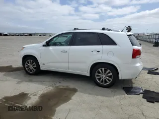 2012 Kia Sorento SX z VIN 5XYKWDA25CG280219, wystawiony jako Copart lot #54397025 z przebiegiem 197 685 mil mil oraz Szkoda całkowita • Salvage title. Historia ofert i sprzedaży dostępna na DreamBid. Obrazek 2.