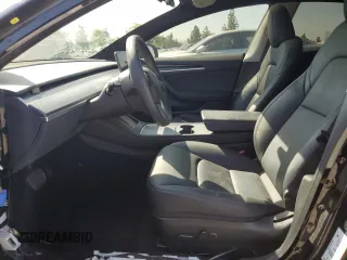 2023 Tesla Model 3 with VIN 5YJ3E1EA4PF562792, listed as a Copart auction lot 55994165 with 17,234 mi miles and Salvage title. Bid and sale history available at DreamBid. Image 7.