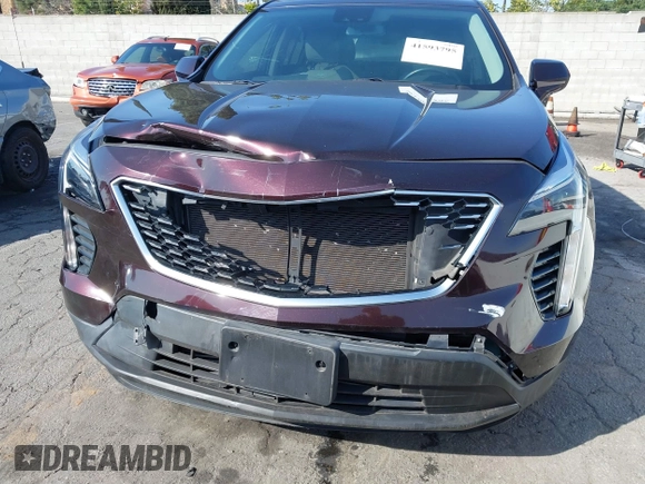 2021 Cadillac XT4 FWD Luxury with VIN 1GYAZAR43MF043816, listed as a IAAI auction lot 41593795 with 36,102 mi miles and . Bid and sale history available at DreamBid. Image 6.