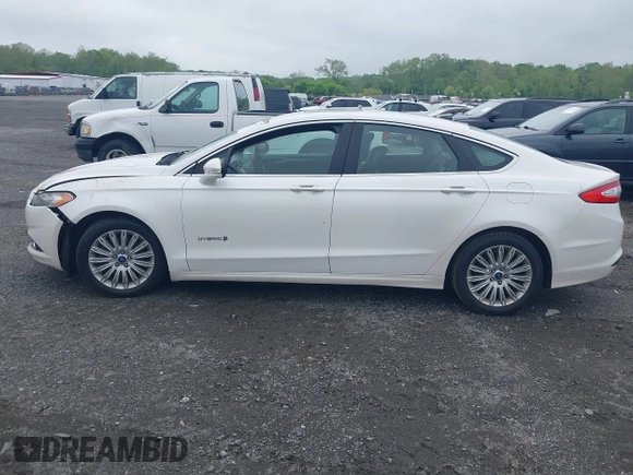 2014 Ford Fusion SE Hybrid с VIN 3FA6P0LUXER125766, выставлен на аукционе IAAI как лот 42178177 с пробегом 284 385 миль миль и . История ставок и продаж доступна на DreamBid. Изображение 14.
