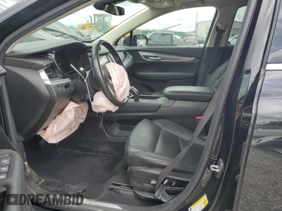 2019 Cadillac XT5 Luxury FWD с VIN 1GYKNCRS7KZ104400, выставлен на аукционе Copart как лот 58704715 с пробегом 80 676 миль миль и Списание • Salvage title. История ставок и продаж доступна на DreamBid. Изображение 7.