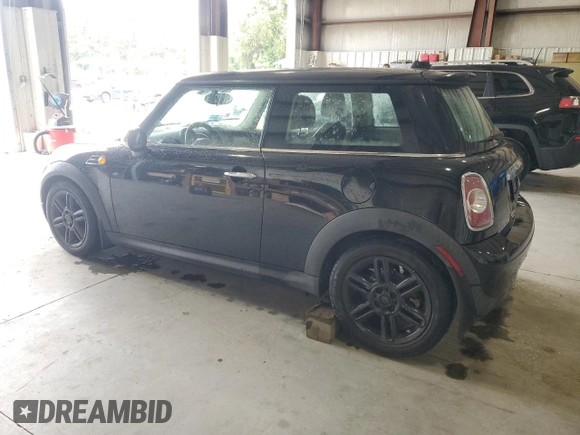 2012 MINI Hardtop with VIN WMWSU3C58CT369968, listed as a Copart auction lot 60102135 with 138,062 mi miles and Salvage title. Bid and sale history available at DreamBid. Image 2.