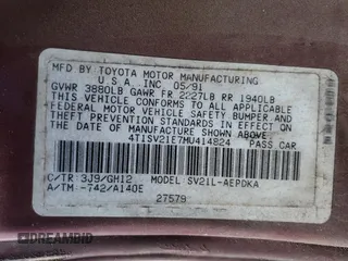1991 Toyota Camry DLX z VIN 4T1SV21E7MU414824, wystawiony jako Copart lot #61604434 z przebiegiem 170 867 mil mil oraz Szkoda całkowita • Salvage title. Historia ofert i sprzedaży dostępna na DreamBid. Obrazek 14.