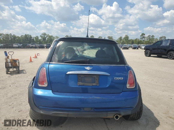 2006 MINI Hardtop with VIN WMWRC33566TK15023, listed as a Copart auction lot 76392014 with Not provided miles and Salvage title. Bid and sale history available at DreamBid. Image 6.