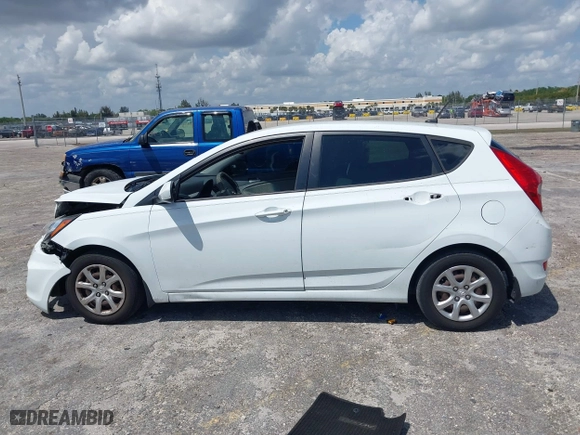 2013 Hyundai Accent GL with VIN KMHCT5AE1DU092600, listed as a IAAI auction lot 41901615 with 126,327 mi miles. Bid and sale history available at carsss.com. Image 14.