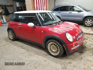 2002 MINI Hardtop with VIN WMWRC33452TC35333, listed as a Copart auction lot 44447425 with 166,353 mi miles and Salvage Title. Bid and sale history available at DreamBid. Image 4.