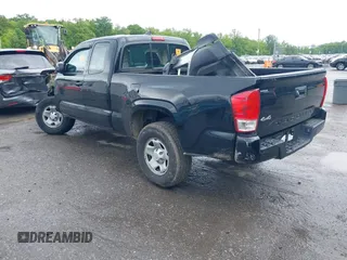 2018 Toyota Tacoma SR with VIN 5TFSX5EN1JX062523, listed as a IAAI auction lot 42334816 with 56,994 mi miles and . Bid and sale history available at DreamBid. Image 3.