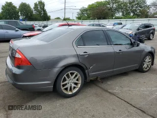 2012 Ford Fusion SEL z VIN 3FAHP0JA2CR232860, wystawiony jako Copart lot #57754735 z przebiegiem 234 638 mil mil oraz Szkody całkowita. Historia ofert i sprzedaży dostępna na DreamBid. Obrazek 3.
