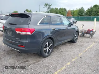 2016 Kia Sorento EX z VIN 5XYPHDA59GG159242, wystawiony jako IAAI lot #42223914 z przebiegiem 267 351 mil mil oraz . Historia ofert i sprzedaży dostępna na DreamBid. Obrazek 4.