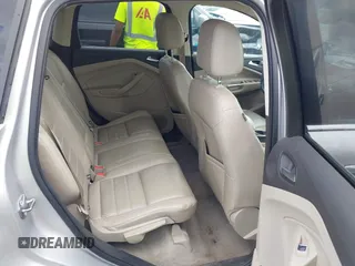 2016 Ford Escape Titanium with VIN 1FMCU9J95GUB93585, listed as a IAAI auction lot 42614106 with 124,465 mi miles and . Bid and sale history available at DreamBid. Image 8.