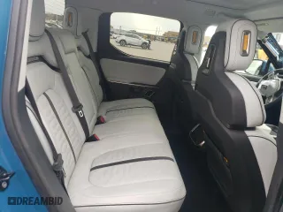 2023 Rivian R1T Adventure with VIN 7FCTGAAA8PN017335, listed as a Copart auction lot 63705604 with 0 mi miles and Clean Title. Bid and sale history available at carsss.com. Image 10.