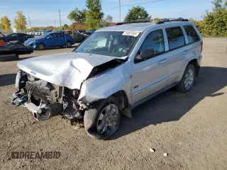 2009 Jeep Grand Cherokee Laredo with VIN 1J8HR48P39C559192, listed as a Copart auction lot 74007094 with 105,997 mi miles and Salvage Title. Bid and sale history available at carsss.com. Image 1.