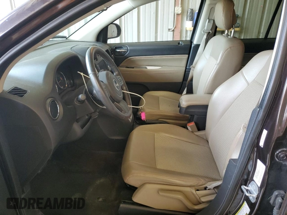 2014 Jeep Compass Latitude with VIN 1C4NJDEB1ED661332, listed as a Copart auction lot 53958985 with 116,020 mi miles and Salvage Title. Bid and sale history available at DreamBid. Image 7.