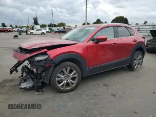 2021 Mazda CX-30 Premium with VIN 3MVDMADL1MM319635, listed as a Copart auction lot 48482585 with 21,192 mi miles and Salvage title. Bid and sale history available at DreamBid. Image 1.