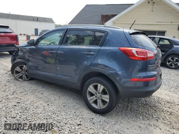 2012 Kia Sportage LX z VIN KNDPBCA27C7234285, wystawiony jako Copart lot #65807995 z przebiegiem 178 515 mil mil oraz Czysty tytuł • Clean title. Historia ofert i sprzedaży dostępna na DreamBid. Obrazek 2.