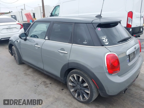 2015 MINI Hardtop 4 Door with VIN WMWXS5C57FT832162, listed as a IAAI auction lot 42159929 with 117,683 mi miles and . Bid and sale history available at DreamBid. Image 3.
