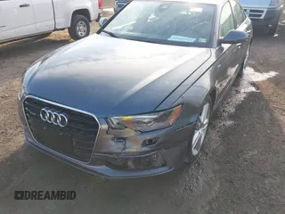 2014 Audi A6 Prestige with VIN WAUHGBFC8EN104920, listed as a IAAI auction lot 41827864 with 70,289 mi miles and . Bid and sale history available at DreamBid. Image 6.
