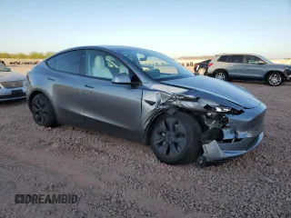 2024 Tesla Model Y Long Range z VIN 7SAYGAEEXRF211507, wystawiony jako Copart lot #56432715 z przebiegiem Nie podano mil oraz Szkoda całkowita • Salvage title. Historia ofert i sprzedaży dostępna na DreamBid. Obrazek 4.