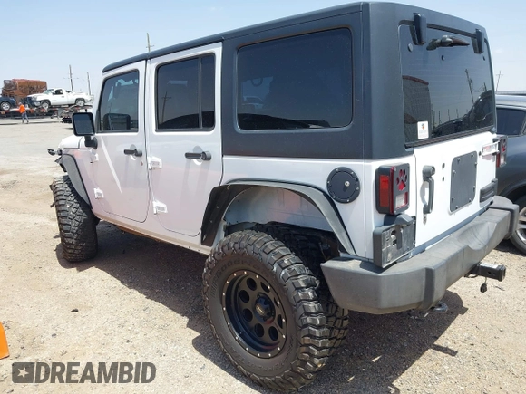 2013 Jeep Wrangler Unlimited Sport with VIN 1C4BJWDGXDL694054, listed as a IAAI auction lot 42097708 with 130,360 mi miles and . Bid and sale history available at DreamBid. Image 3.