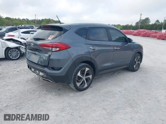2016 Hyundai Tucson Limited with VIN KM8J33A27GU245096, listed as a IAAI auction lot 41961905 with 101,195 mi miles. Bid and sale history available at carsss.com. Image 4.