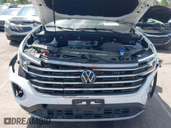 2024 Volkswagen Atlas SE z VIN 1V2HR2CA7RC532493, wystawiony jako IAAI lot #41970251 z przebiegiem 32 124 mil mil oraz . Historia ofert i sprzedaży dostępna na DreamBid. Obrazek 10.