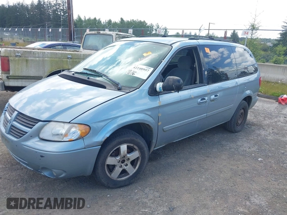 2005 Dodge Caravan SXT with VIN 2D4GP44LX5R528909, listed as a IAAI auction lot 42248957 with Not Provided miles and . Bid and sale history available at DreamBid. Image 2.