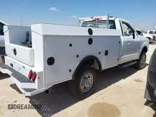 2024 Ford F-250 XL with VIN 1FTBF2BA5REE36108, listed as a IAAI auction lot 42106164 with 20,965 mi miles and . Bid and sale history available at DreamBid. Image 3.
