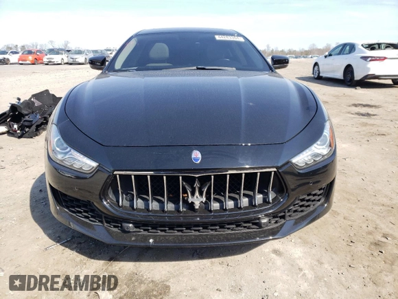 2018 Maserati Ghibli with VIN ZAM57XSA5J1286080, listed as a Copart auction lot 44283304 with 57,328 mi miles. Bid and sale history available at carsss.com. Image 5.