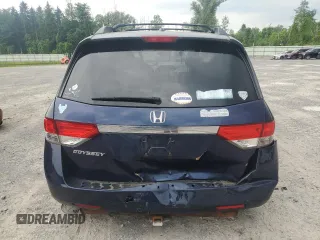 2014 Honda Odyssey EX-L with VIN 5FNRL5H63EB013483, listed as a Copart auction lot 63002435 with 127,059 mi miles and Salvage title. Bid and sale history available at DreamBid. Image 6.