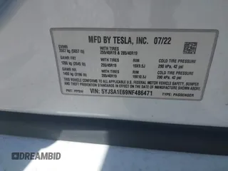 2022 Tesla Model S Plaid with VIN 5YJSA1E69NF486471, listed as a IAAI auction lot 41228818 with 49,207 mi miles and . Bid and sale history available at carsss.com. Image 9.