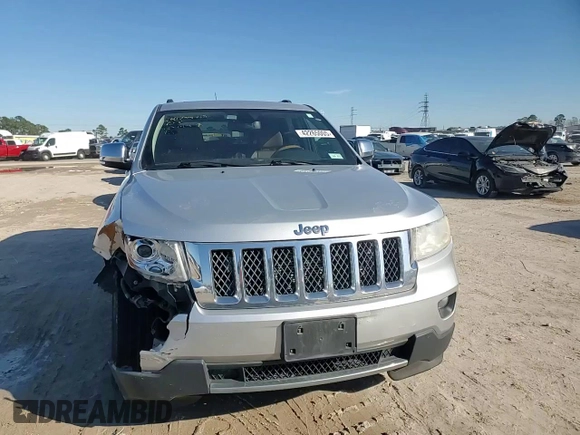 2013 Jeep Grand Cherokee Overland with VIN 1C4RJECG4DC644809, listed as a Copart auction lot 42265005 with 213,493 mi miles and Salvage Title. Bid and sale history available at carsss.com. Image 12.