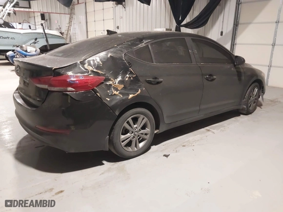 2018 Hyundai Elantra Value Edition with VIN KMHD84LF9JU545086, listed as a IAAI auction lot 41623845 with 128,973 mi miles. Bid and sale history available at carsss.com. Image 4.