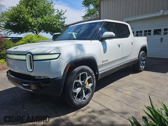 2023 Rivian R1T Adventure z VIN 7FCTGAAA1PN020478, wystawiony jako IAAI lot #42361936 z przebiegiem 443 mil mil oraz . Historia ofert i sprzedaży dostępna na DreamBid. Obrazek 2.