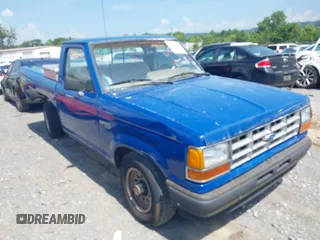 1989 Ford Ranger z VIN 1FTCR10TXKUB25585, wystawiony jako IAAI lot #42735826 z przebiegiem 474 447 mil mil oraz . Historia ofert i sprzedaży dostępna na DreamBid. Obrazek 1.