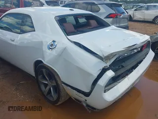 2014 Dodge Challenger R/T Plus z VIN 2C3CDYBT9EH293136, wystawiony jako IAAI lot #42264180 z przebiegiem 71 696 mil mil oraz . Historia ofert i sprzedaży dostępna na DreamBid. Obrazek 6.