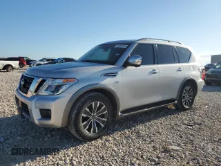 2020 Nissan Armada SL z VIN JN8AY2NC7LX516562, wystawiony jako Copart lot #56302135 z przebiegiem 181 152 mil mil oraz Czysty tytuł • Clean title. Historia ofert i sprzedaży dostępna na DreamBid. Obrazek 1.