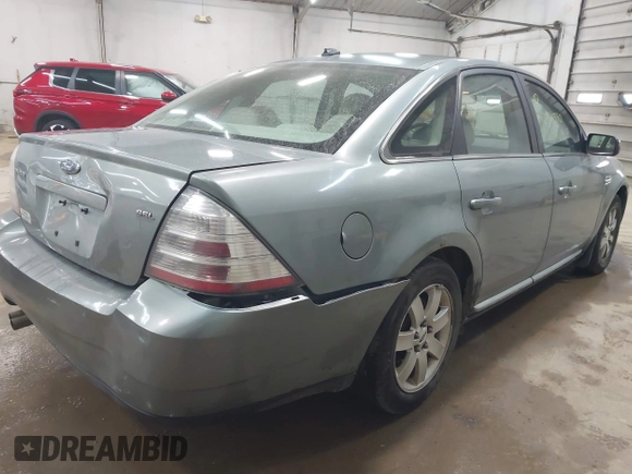 2008 Ford Taurus SEL with VIN 1FAHP24W18G159322, listed as a IAAI auction lot 42144590 with 163,397 mi miles and . Bid and sale history available at DreamBid. Image 4.