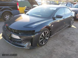 2023 Lucid Air Touring with VIN 50EA1TEA1PA002151, listed as a IAAI auction lot 41219565 with 8,215 mi miles. Bid and sale history available at carsss.com. Image 2.