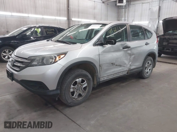 2014 Honda CR-V LX with VIN 2HKRM4H38EH723171, listed as a IAAI auction lot 41931115 with 132,417 mi miles and . Bid and sale history available at carsss.com. Image 2.