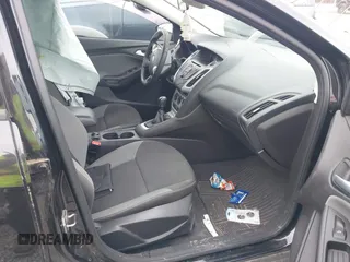 2013 Ford Focus SE z VIN 1FADP3F28DL349005, wystawiony jako IAAI lot #42055478 z przebiegiem 137 599 mil mil oraz . Historia ofert i sprzedaży dostępna na DreamBid. Obrazek 5.