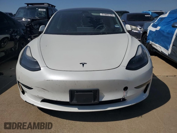 2023 Tesla Model 3 with VIN 5YJ3E1EA9PF510588, listed as a Copart auction lot 51860125 with Not provided miles and Clean title. Bid and sale history available at DreamBid. Image 5.