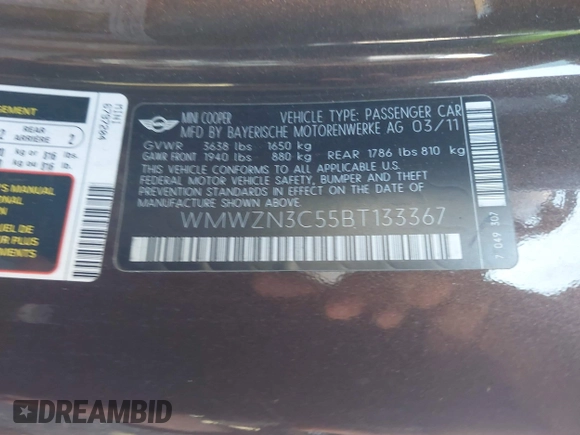 2011 MINI Convertible with VIN WMWZN3C55BT133367, listed as a IAAI auction lot 41781374 with 124,036 mi miles and . Bid and sale history available at DreamBid. Image 9.
