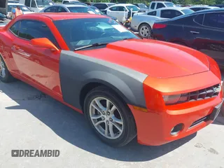 2013 Chevrolet Camaro LT z VIN 2G1FB1E35D9200406, wystawiony jako IAAI lot #42398599 z przebiegiem 118 700 mil mil oraz . Historia ofert i sprzedaży dostępna na DreamBid. Obrazek 6.