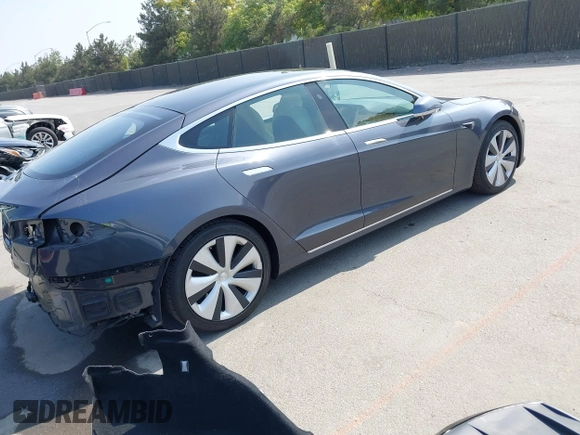 2020 Tesla Model S Long Range with VIN 5YJSA1E24LF415849, listed as a IAAI auction lot 42571945 with 34,398 mi miles and . Bid and sale history available at DreamBid. Image 4.